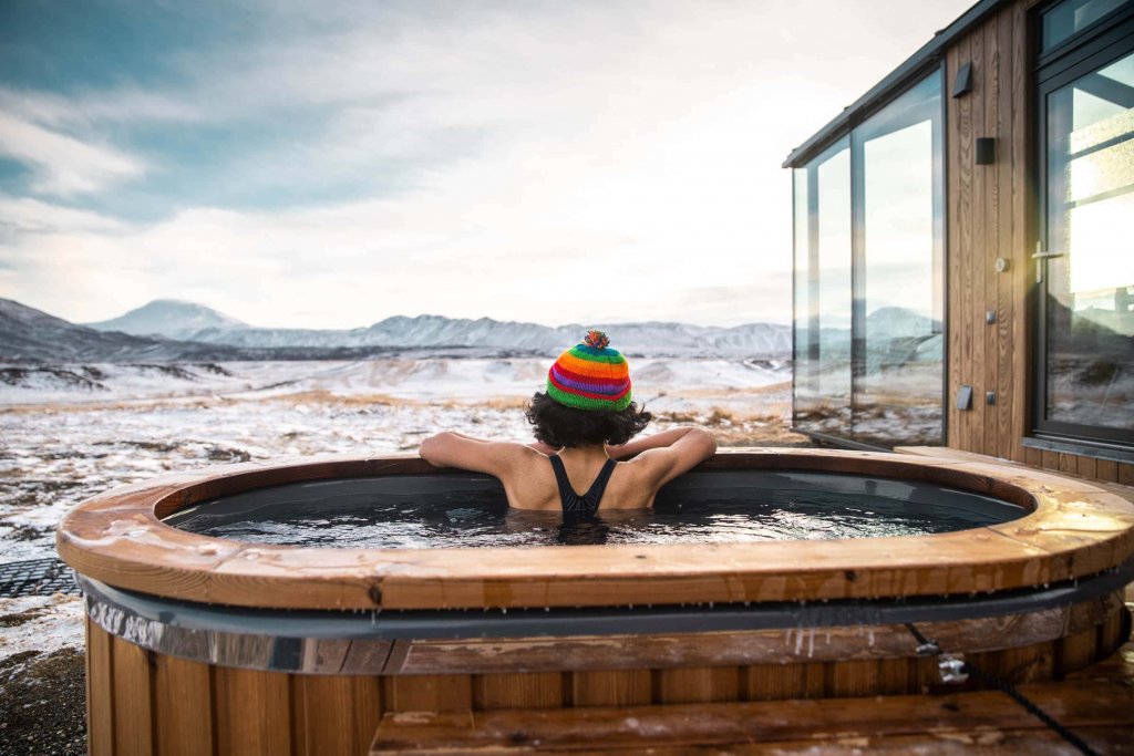 glass cabins iceland hot tub