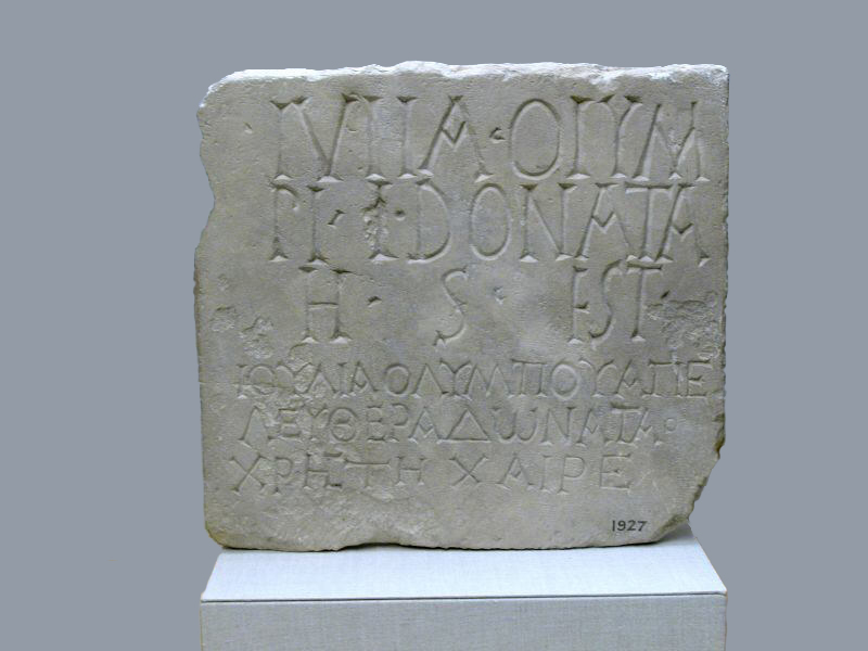 Limestone plaque with bilingual inscription