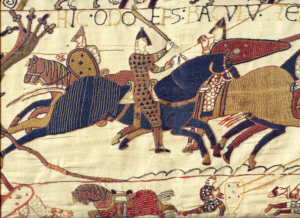 A scene from the Bayeux Tapestry depicting Bishop Odo rallying Duke Williams army during the Battle of Hastings in 1066