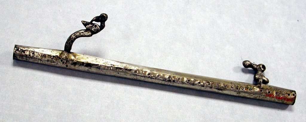 A silver Peruvian atlatl from the 12th 15th century